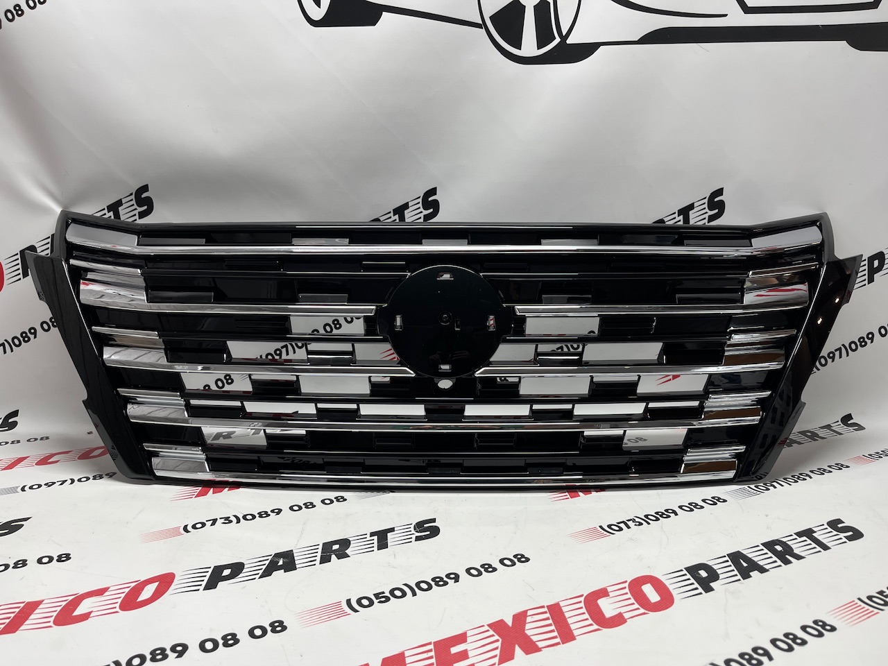 Решетка радиатора под камеру Nissan X-Trail(Rogue) 2024+( 62310-4MT0B), аналог