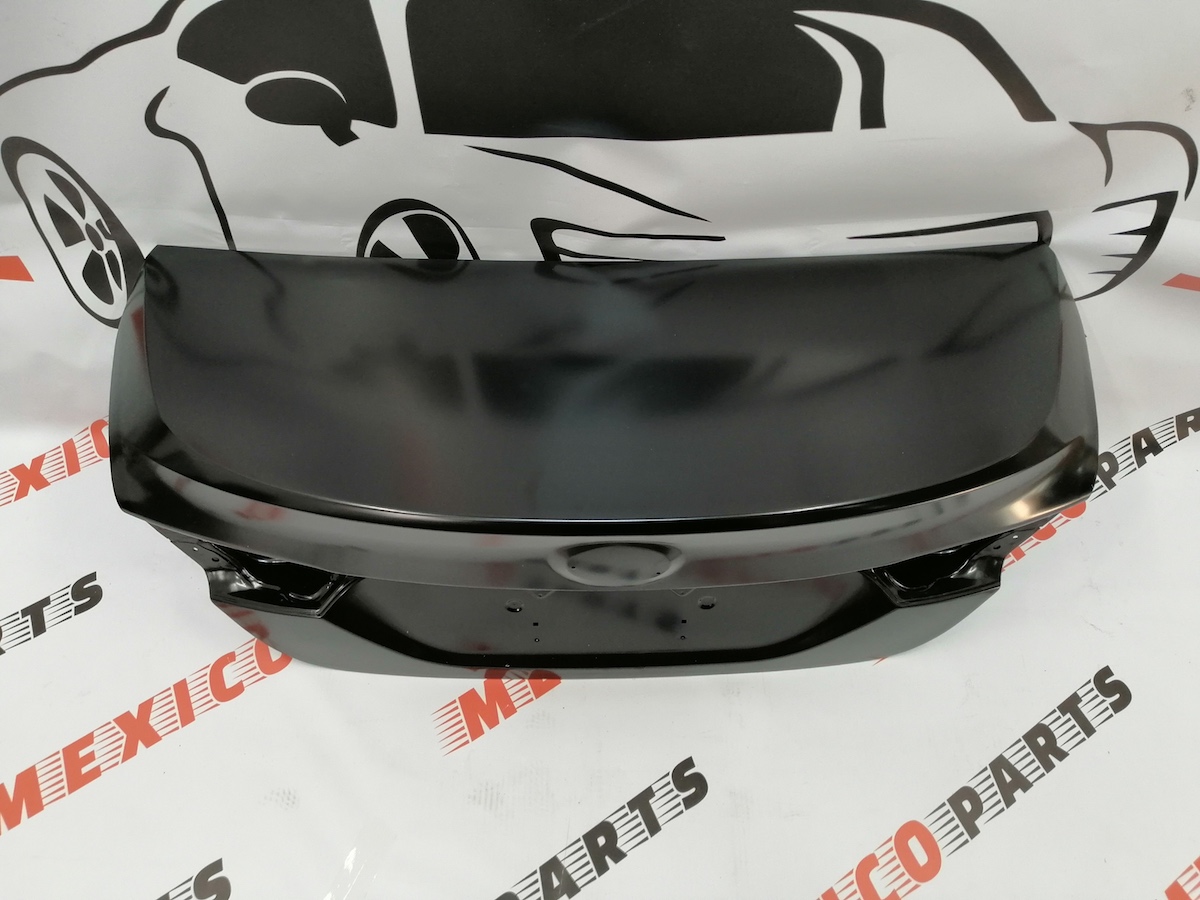 Кришка багажника Toyota Camry 2018-2024 (64401-06E00), аналог