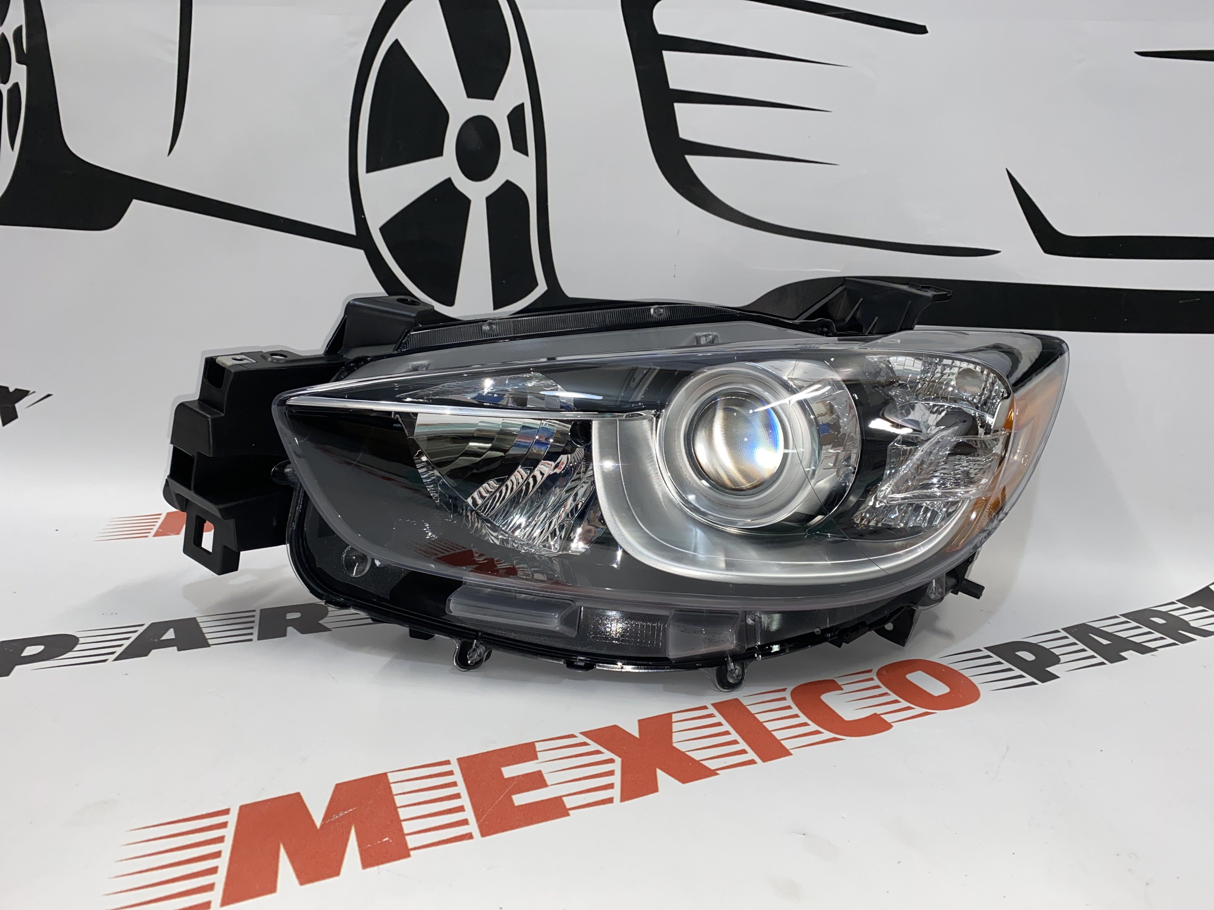 Фара ліва USA Mazda CX5 2014-2017(KJ0151041C), аналог