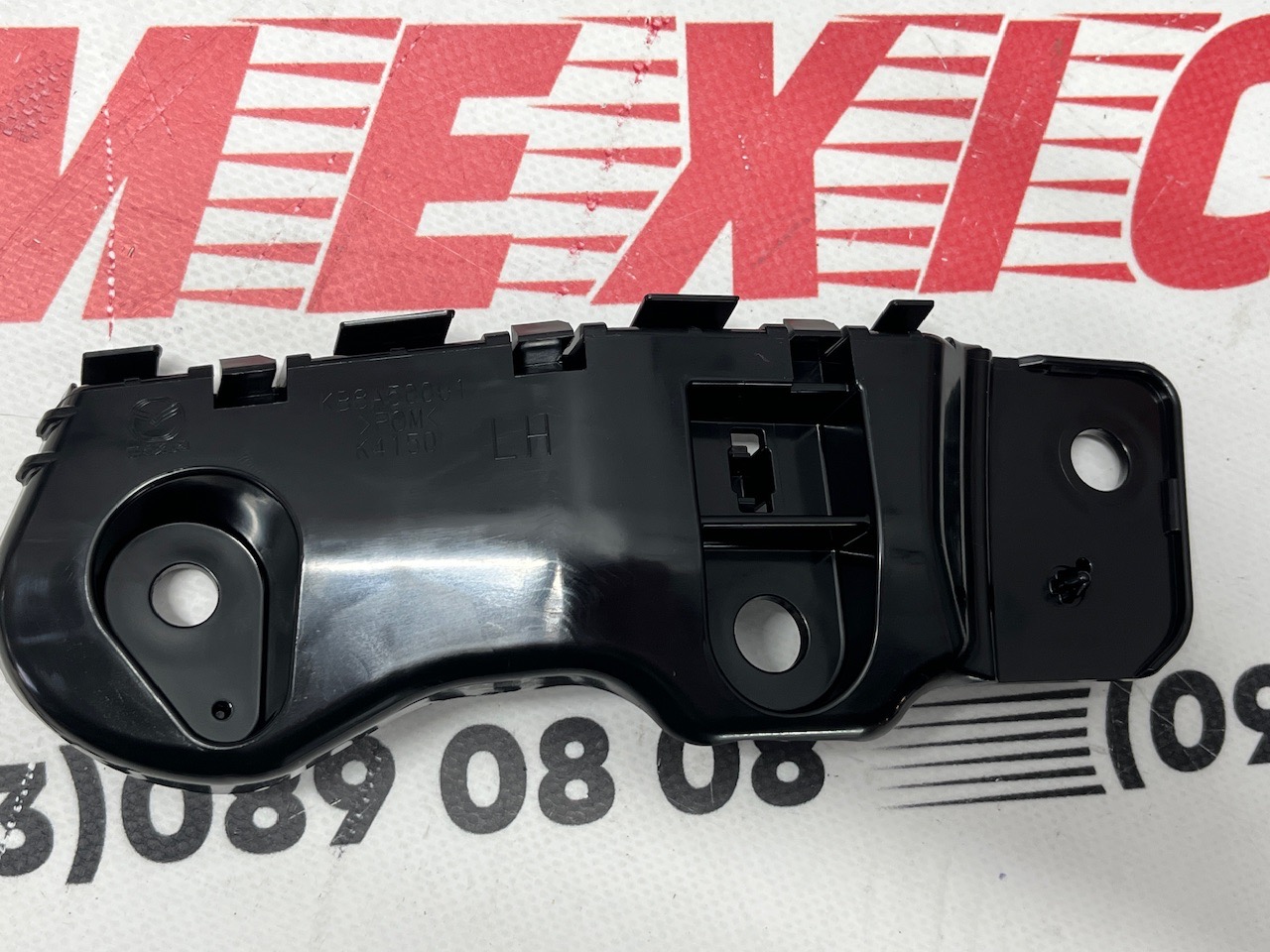 Кріплення переднього бампера ліве оригінал  Mazda CX5 2017-2020 (KB8A-50-0U1A)