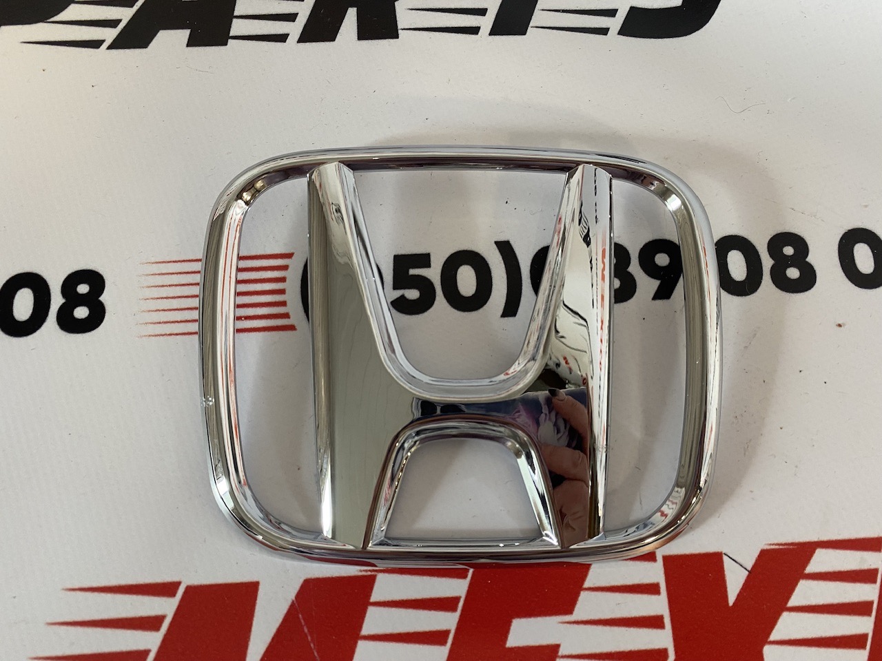 Логотип решетки радиатора Honda CR-V 2015-2016 (75700SZW000), аналог