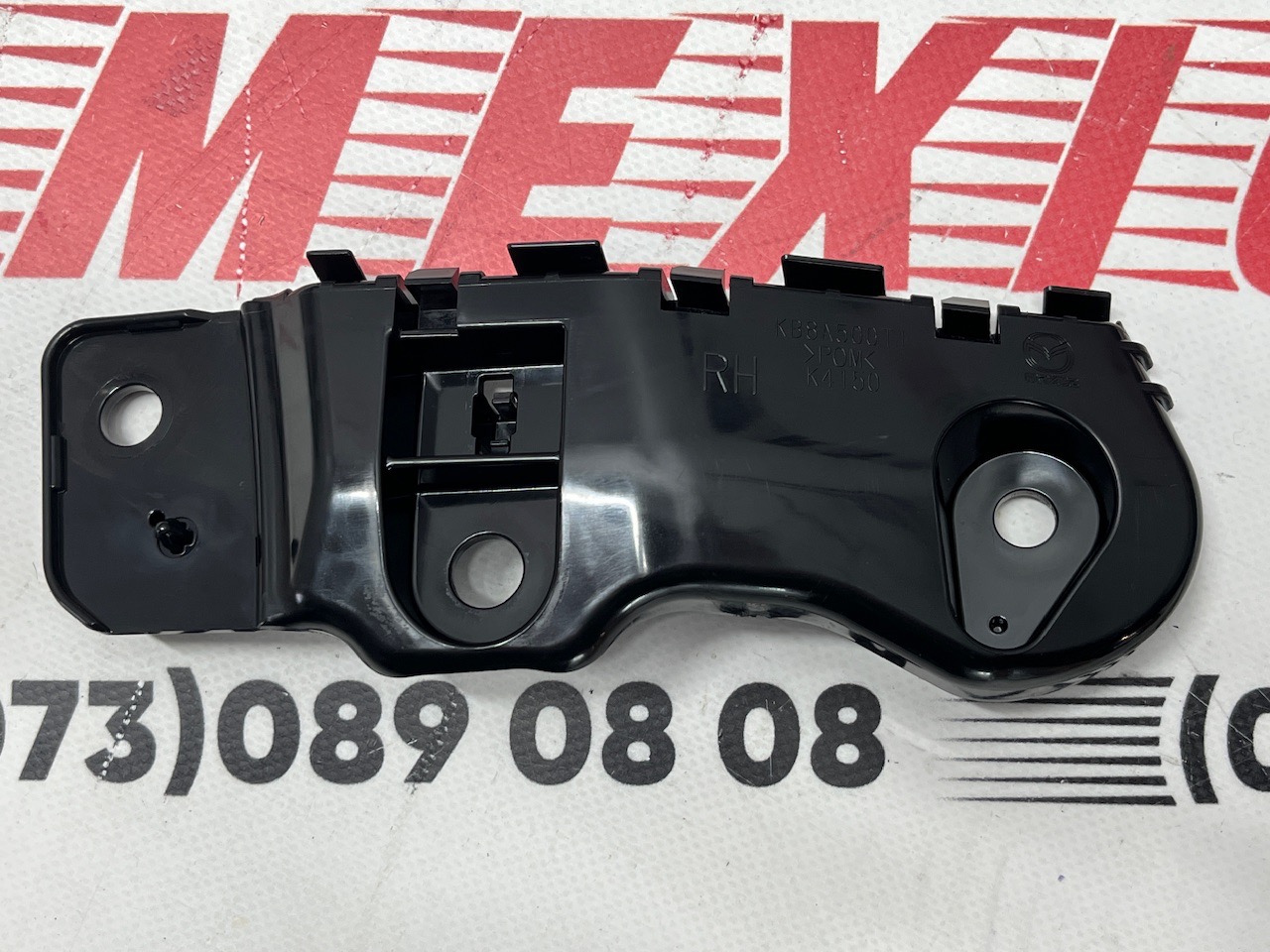 Кріплення переднього бампера праве оригінал Mazda CX5 2017-2020 (KB8A-50-0T1A)