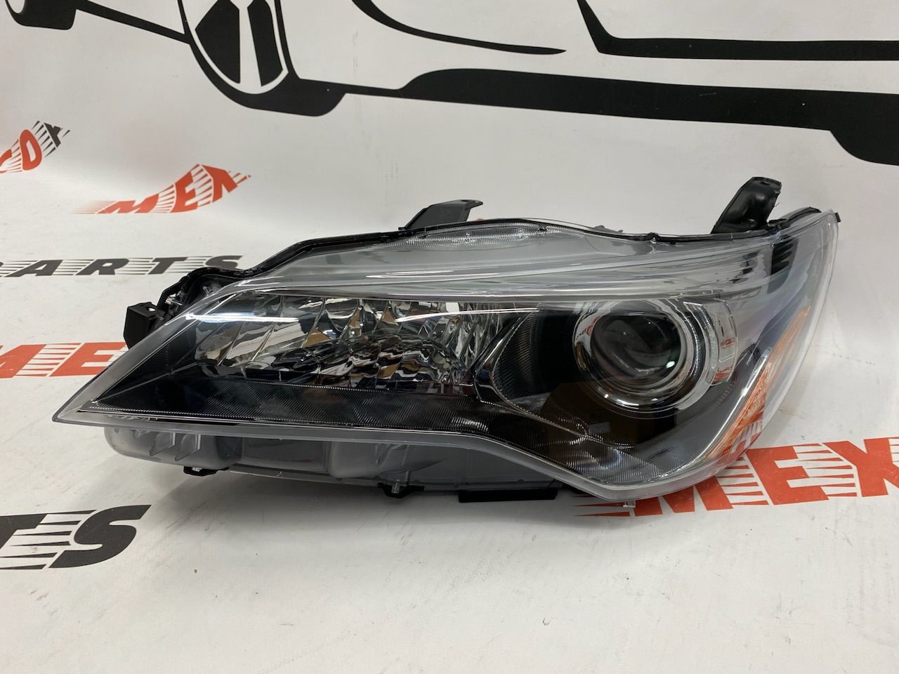 Фара ліва чорна компл. LE USA Toyota Camry 2015-2017 (81150-06C70), аналог