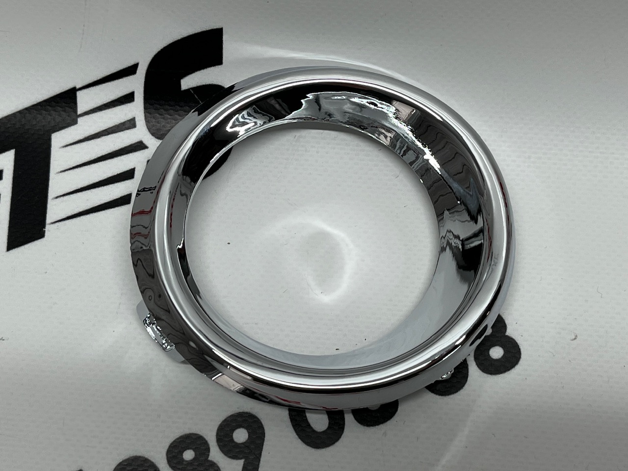 Хром протитуманної фари ліва Mazda 3 2013-2015 (BJE150C22), аналог