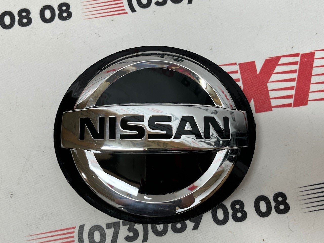 Значок под дистроном Nissan Sentra 2019- (628906LH0A), аналог