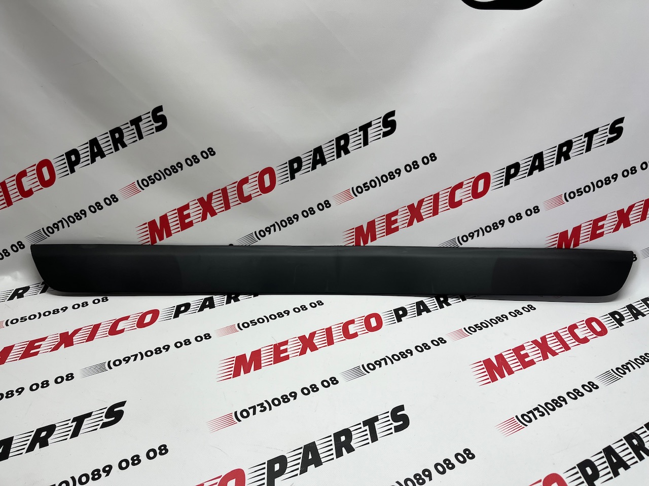 Накладка на крышку багажника нижняя Toyota RAV4 2019-2021 (768020R030), аналог